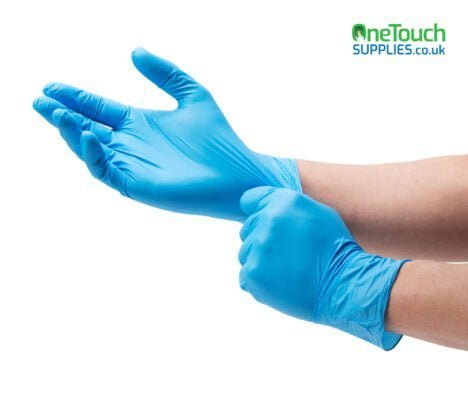 Two hands preparing to wear Blue Disposable Nitrile Gloves - Medical Grade, Latex & Powder-Free for enhanced protection.